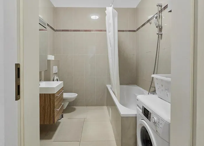 Two-bedroom Balcony Retreat For 4 Near Millennium Tower Apartment