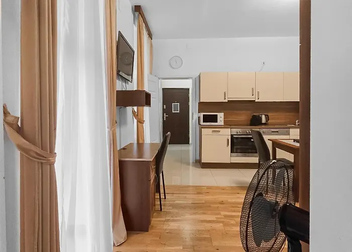Two-bedroom Balcony Retreat For 4 Near Millennium Tower Apartment